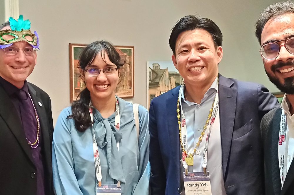 Dr. Mohit Seth with international colleagues at SNMMI 2025